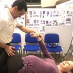 A chiropractor caring for a pregnant woman